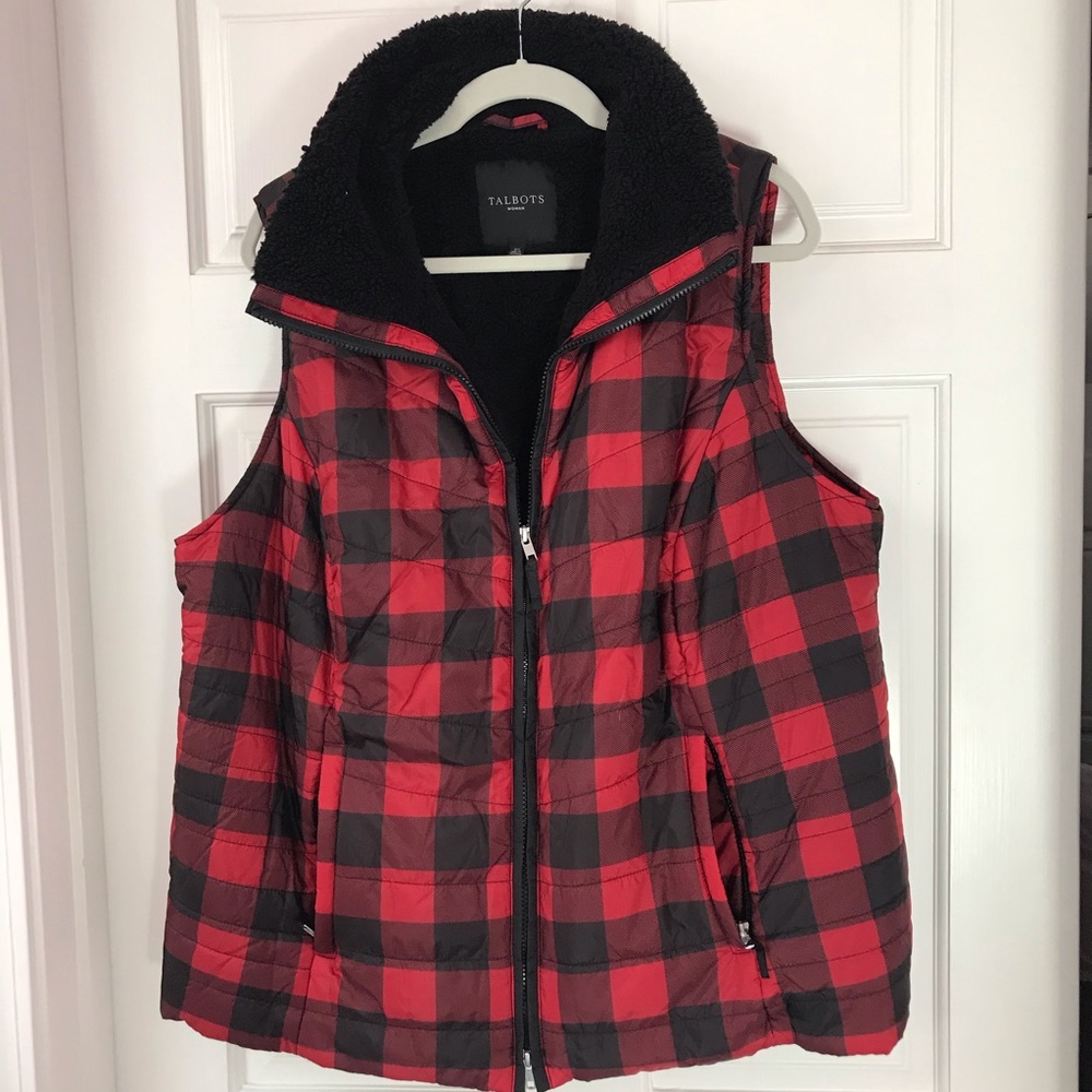 Puffy vest with cozy black lining.